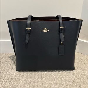 Dark blue Coach purse